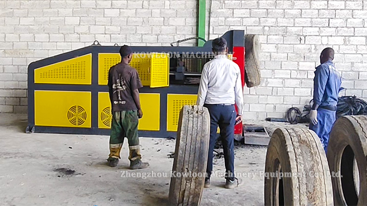 Tire debeader machine for separating steel bead from scrap tires
