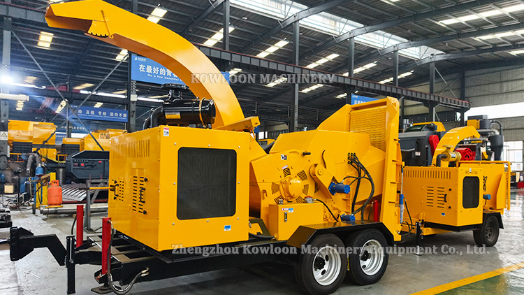 towable wood chipper crushing garden waste